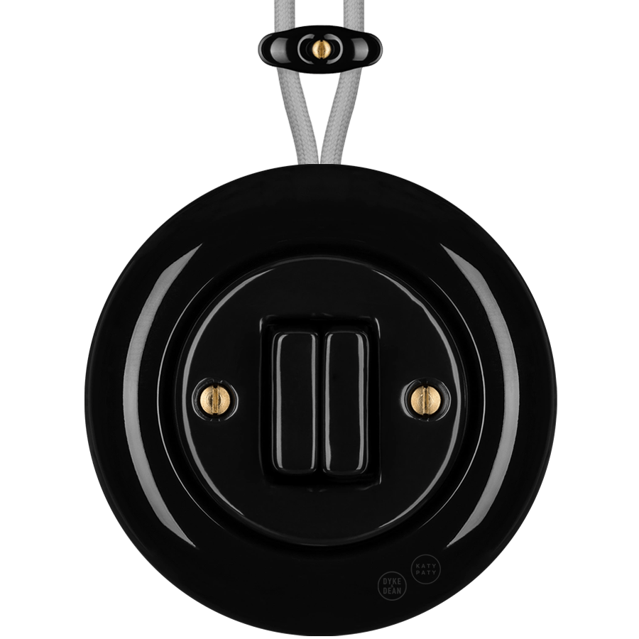 PORCELAIN KATY PATY COLONA ROUND SURFACE MOUNTED DOUBLE SLIM BUTTON SWITCH BLACK - DYKE & DEAN