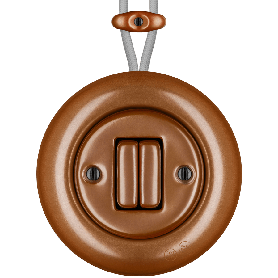 PORCELAIN KATY PATY COLONA ROUND SURFACE MOUNTED DOUBLE SLIM BUTTON SWITCH COPPER - DYKE & DEAN