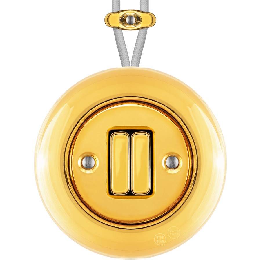 PORCELAIN KATY PATY COLONA ROUND SURFACE MOUNTED DOUBLE SLIM BUTTON SWITCH GOLD - DYKE & DEAN