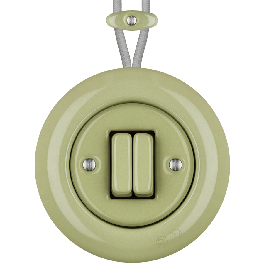 PORCELAIN KATY PATY COLONA ROUND SURFACE MOUNTED DOUBLE SLIM BUTTON SWITCH MOSS GREEN - DYKE & DEAN