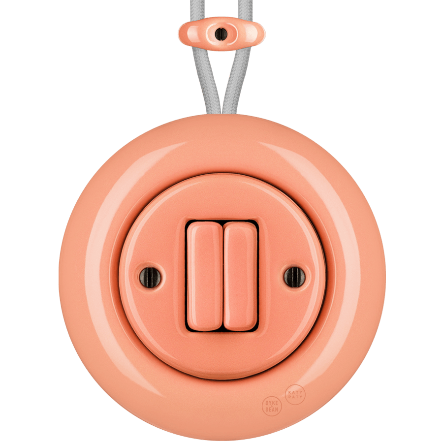 PORCELAIN KATY PATY COLONA ROUND SURFACE MOUNTED DOUBLE SLIM BUTTON SWITCH SALMON PINK - DYKE & DEAN