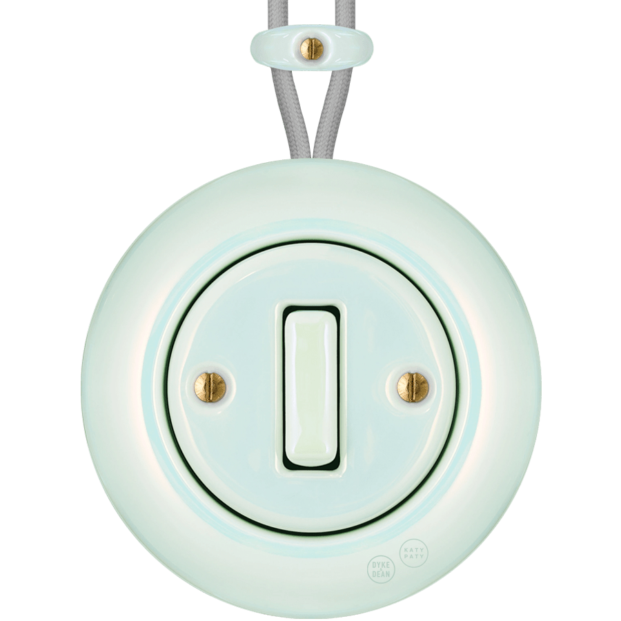 PORCELAIN KATY PATY COLONA ROUND SURFACE MOUNTED SLIM BUTTON SWITCH CONCHA - DYKE & DEAN