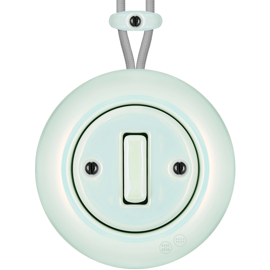 PORCELAIN KATY PATY COLONA ROUND SURFACE MOUNTED SLIM BUTTON SWITCH CONCHA - DYKE & DEAN