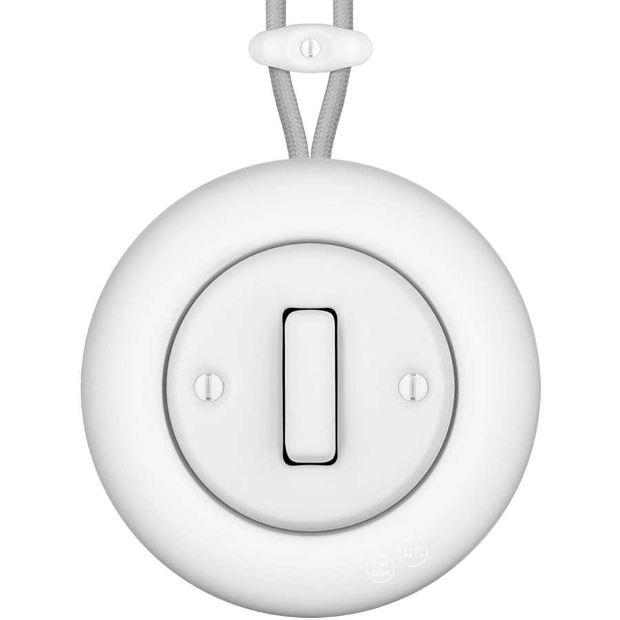 PORCELAIN KATY PATY COLONA ROUND SURFACE MOUNTED SLIM BUTTON SWITCH MATTE WHITE - DYKE & DEAN