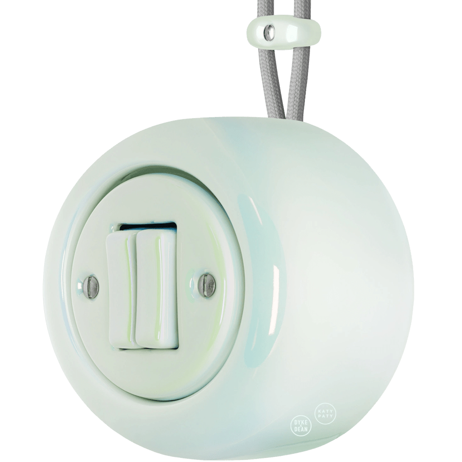 PORCELAIN ROUND SURFACE MOUNTED DOUBLE SLIM BUTTON SWITCH CONCHA - DYKE & DEAN