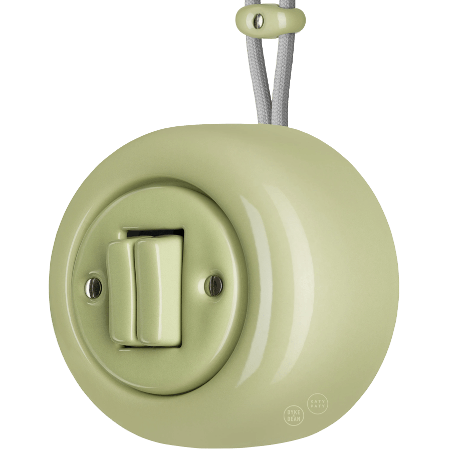 PORCELAIN ROUND SURFACE MOUNTED DOUBLE SLIM BUTTON SWITCH MOSS GREEN - DYKE & DEAN