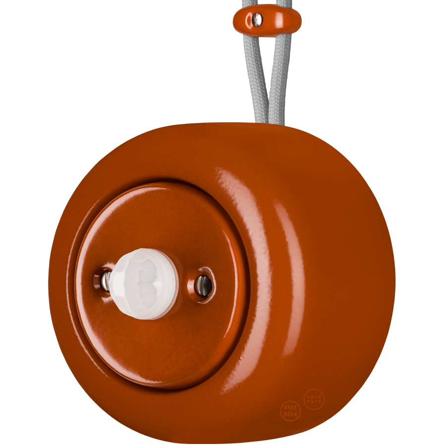 PORCELAIN ROUND SURFACE MOUNTED MOTION SENSOR BRICK RED - DYKE & DEAN