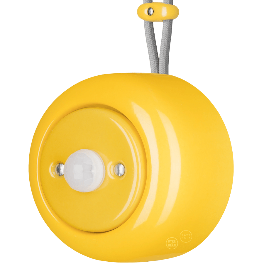 PORCELAIN ROUND SURFACE MOUNTED MOTION SENSOR YELLOW - DYKE & DEAN