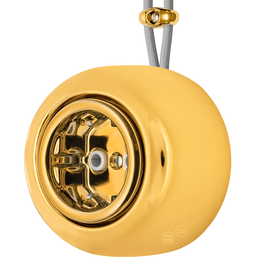 PORCELAIN ROUND SURFACE MOUNTED SCHUKO SOCKET GOLD - DYKE & DEAN