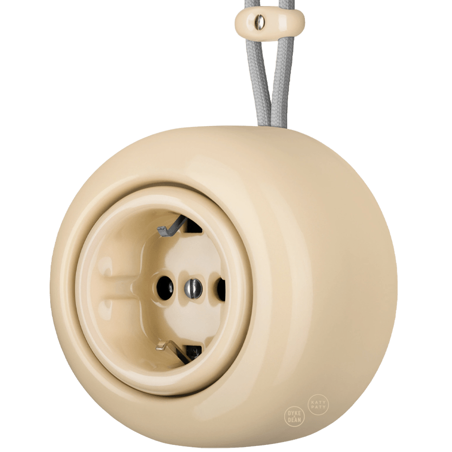 PORCELAIN ROUND SURFACE MOUNTED SCHUKO SOCKET SAND - DYKE & DEAN
