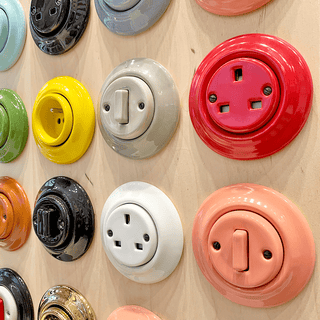 PORCELAIN WALL LIGHT SWITCH AZURE ROTARY - DYKE & DEAN